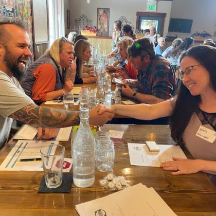 people meeting for lunch at a table 