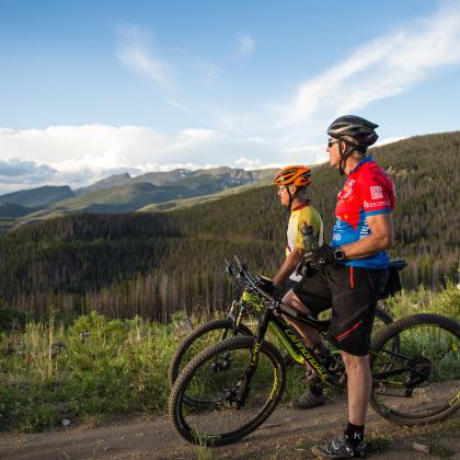 Bikers enjoying a scenic view of Winter Park and t
