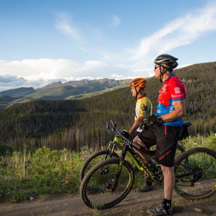 Bikers enjoying a scenic view of Winter Park and t