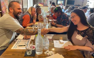 people meeting for lunch at a table 