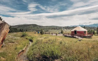 yurt with a mountain background