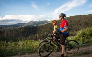 Bikers enjoying a scenic view of Winter Park and t