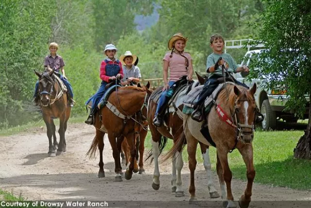 Family fun at one of our guest ranches Photo 2