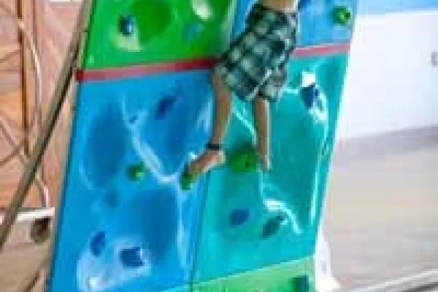 Our indoor pool offers a slide, aqua climbing wall and a sauna Photo 8