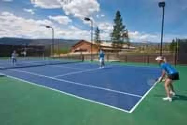 Play some tennis on our tennis courts Photo 5