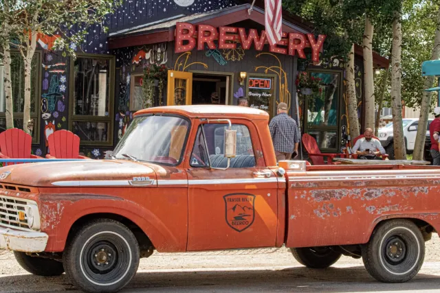 Fraser River Beer CoVintage red pickup truck parked outside vibrant brewery. Come mix and mingle with your favorite Chamber Members. Photo 2