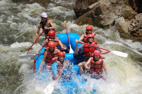 Going through the rapids with MAD Adventures
