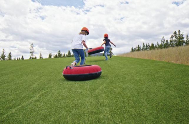 Kids playing in tube on Mounatin