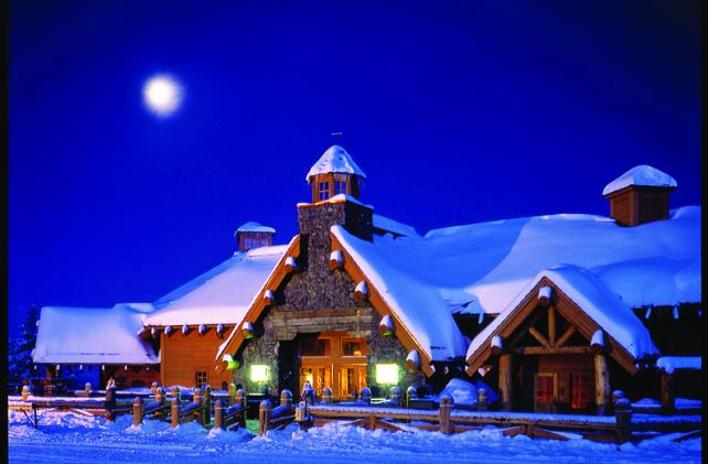 lodge in the moonlight with snow 