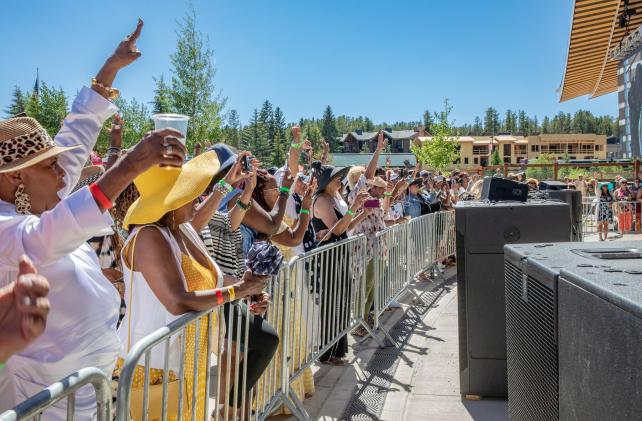 Crowd along barricade at Jazz Fest